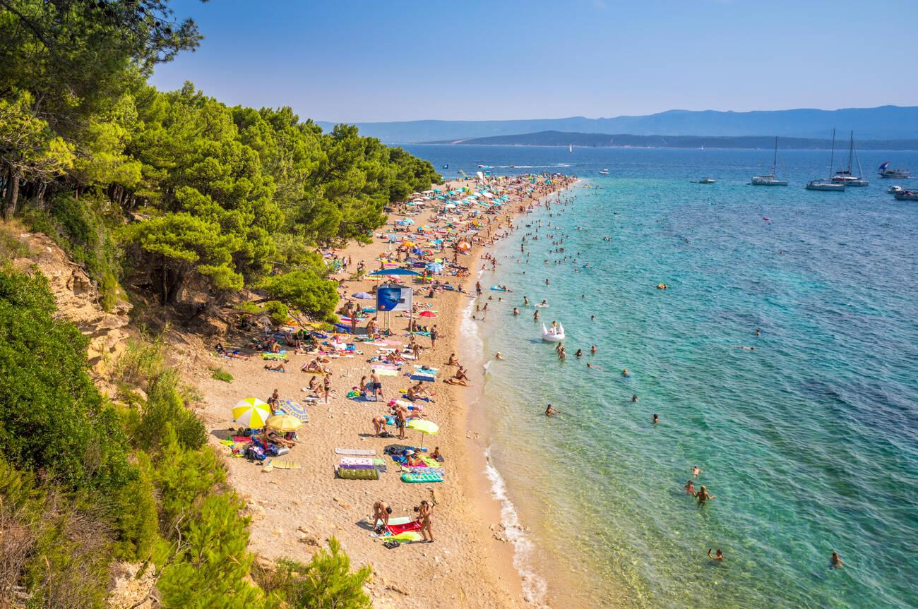 Swimming in the crystal clear waters at Zlatni Rat